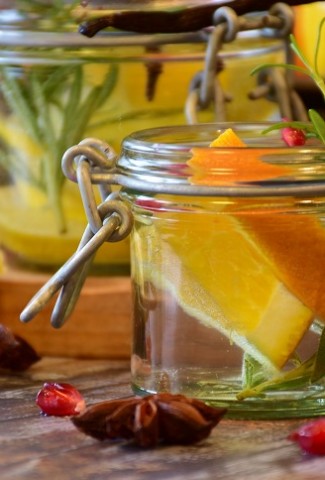 Holiday Tea Recipes Jars of Water with Fruit and Herbs Inside